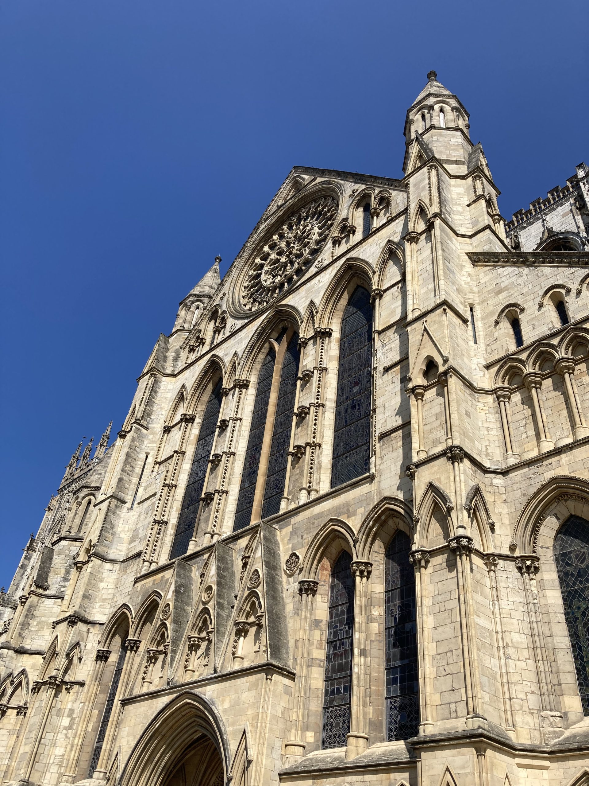 A picture of the front side of the York Minster with clear blue skies