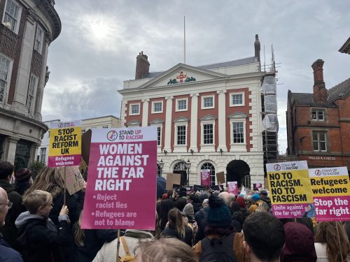 Protesters holding anti-far right and anti-racism signs gather in St Helen's Square
