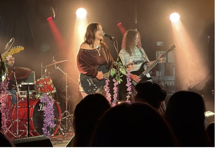 The band 'Wysteria' performing. Shows the lead singer and the guitarist